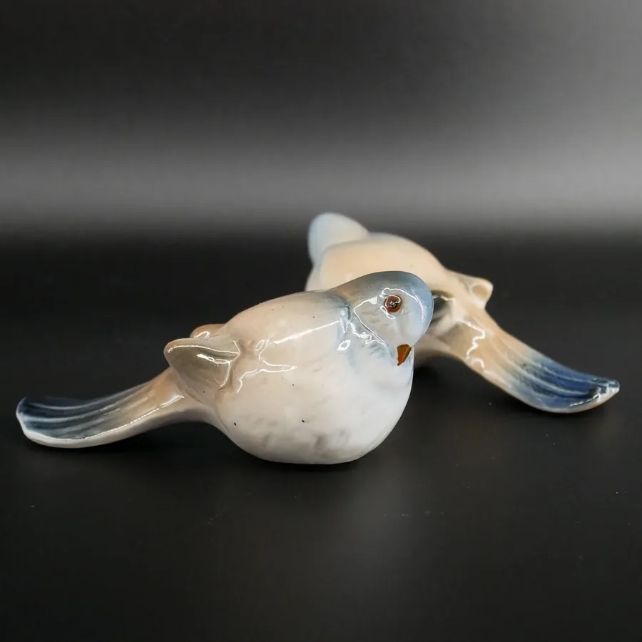 Bing & Gröndahl vintage bird pair displayed side by side showing matching Danish porcelain craftsmanship and similar glaze pa