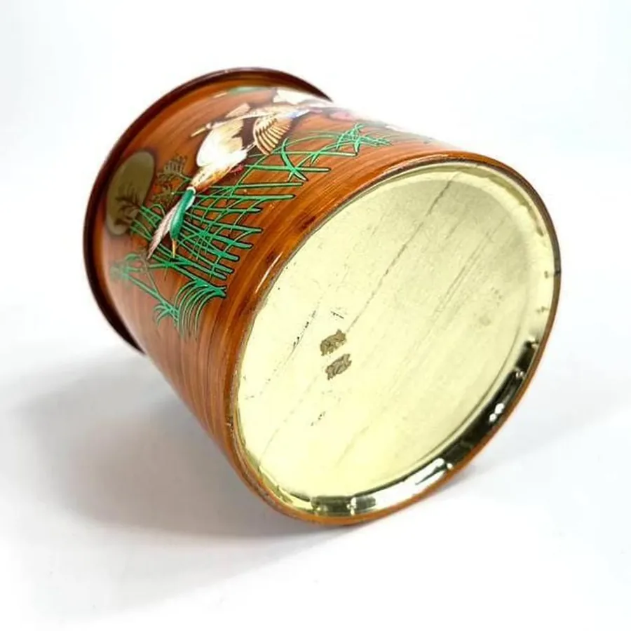 Bottom base view of vintage 1940s cookie tin showing manufacturing marks and Metal Box Company details