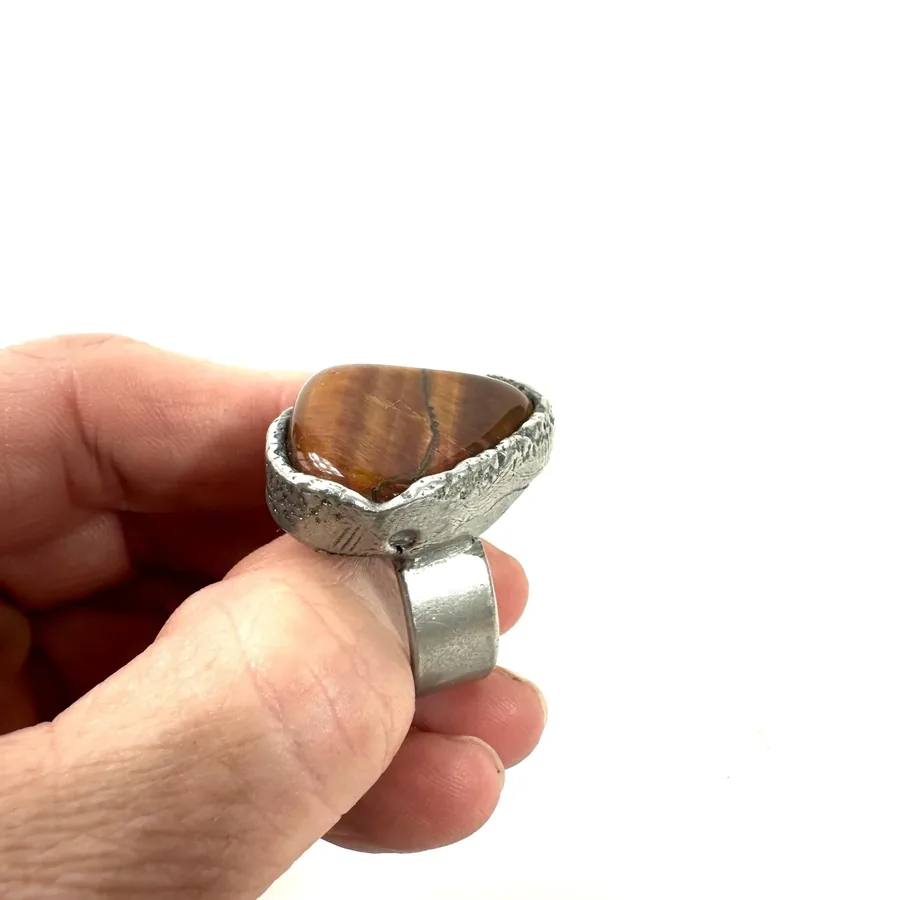 Close-up of silver patina and metalwork detail, unmarked artisan construction with vintage aging marks