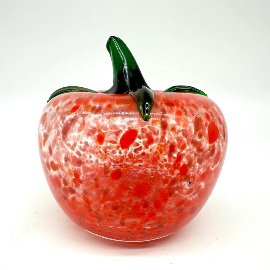Detailed view of glass tomato bottom and full body showing speckle distribution and craftsmanship
