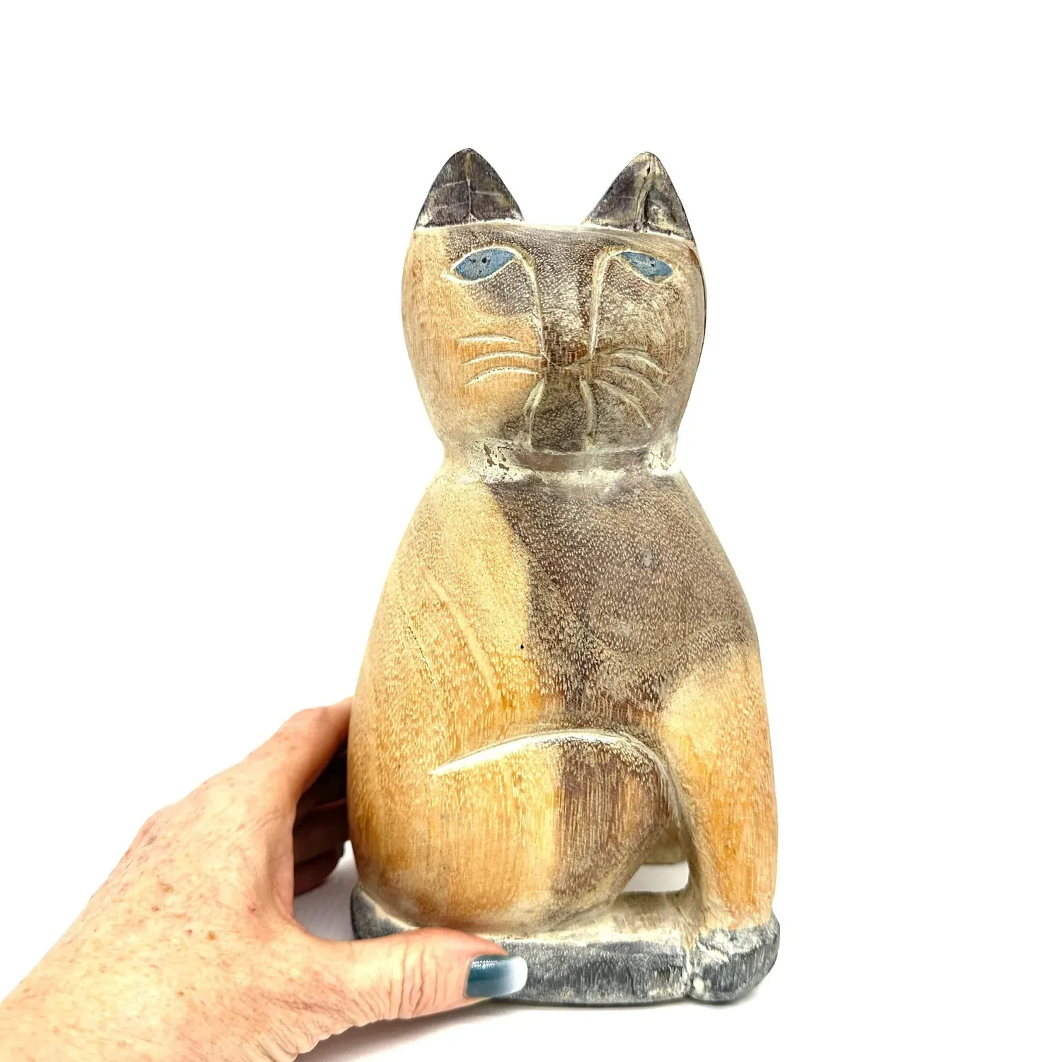 Hand-carved wooden cat doorstop with weathered paint, folk art design, 23cm tall, front facing view