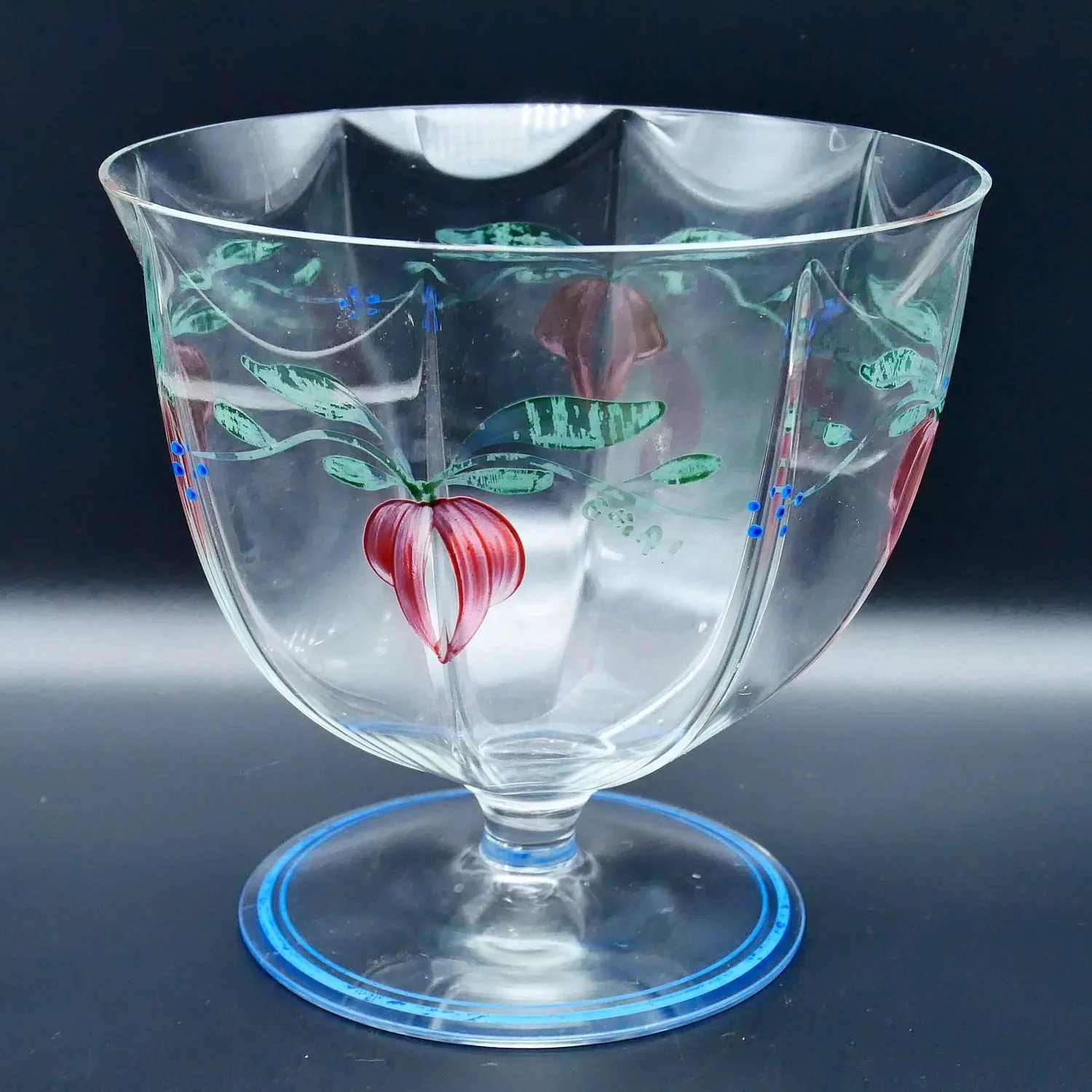 Orrefors Maja crystal bowl by Eva Englund, featuring hand-painted red lady's slipper flowers and green foliage with blue base