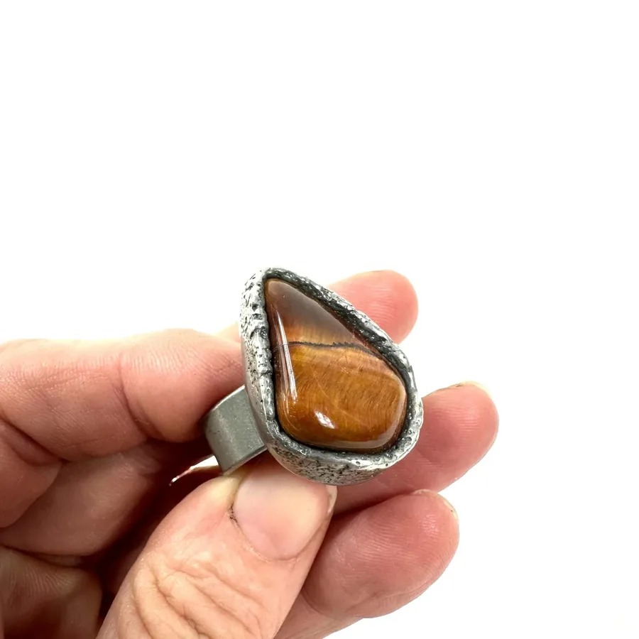Profile view of ring showing height and proportion of Tiger's Eye setting relative to silver band