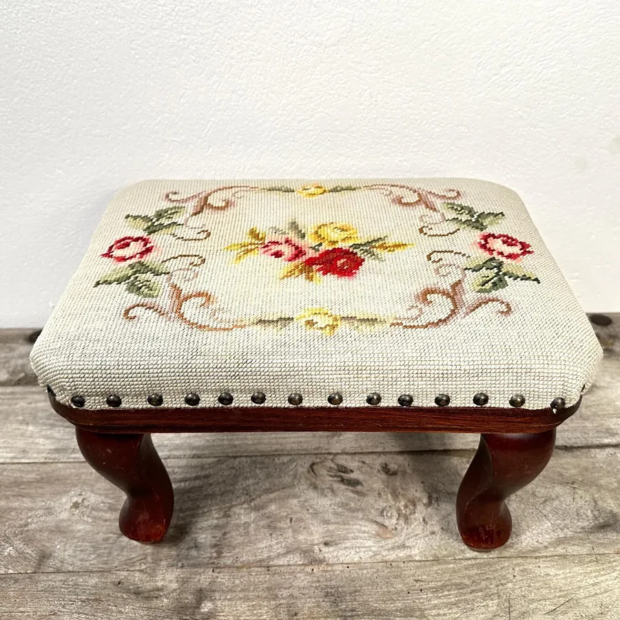 Side angle highlighting wooden frame thickness, needlepoint fabric attachment, and Swedish construction quality