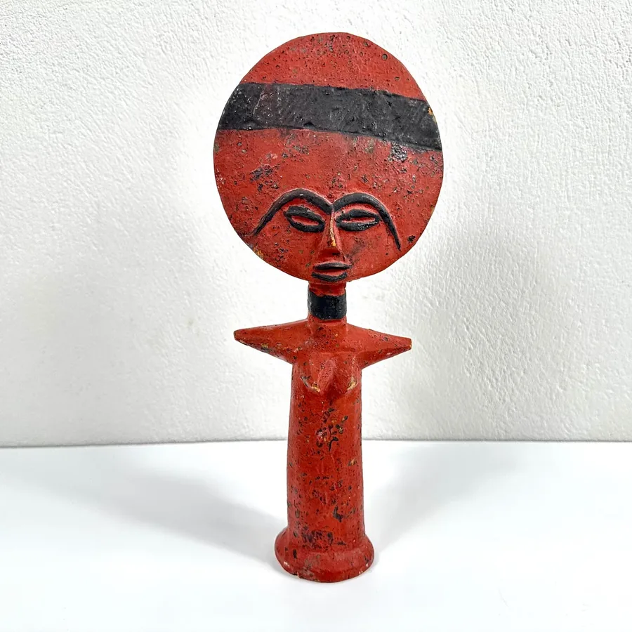 Ashanti Akuaba fertility doll, hand-carved wood, red with black stripe band, tribal face carving, cross-shaped base