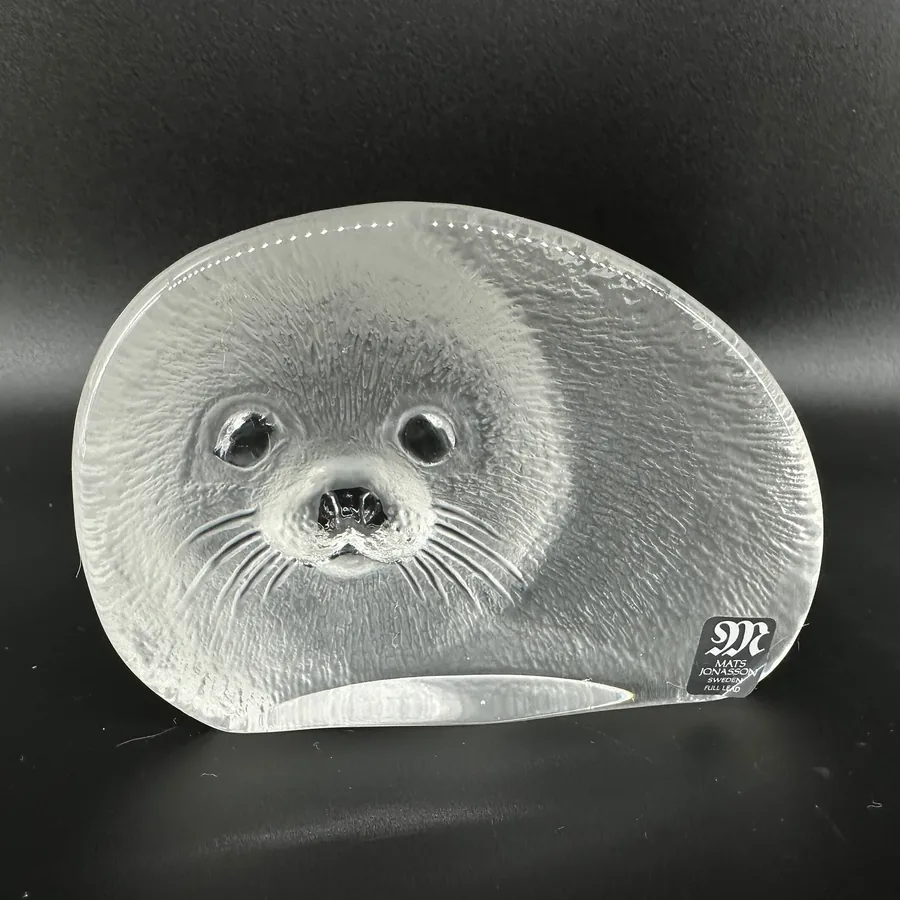 Mats Jonasson hand-blown crystal seal paperweight, frosted glass with detailed facial features and whiskers, Swedish design