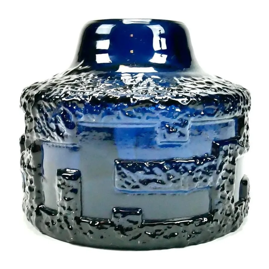 Top-angled view of 1960s Swedish blue vase displaying dimensional textural relief and thick glass construction