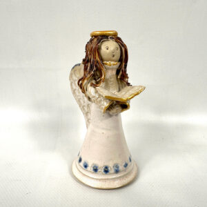 Vintage Scandinavian ceramic angel figurine with extruded spaghetti-textured brown hair, cream glaze body, gold halo and song