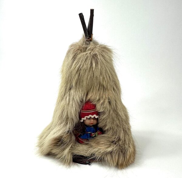 Lapland Sami doll in reindeer skin teepee positioned to show front entrance with doll visible and natural cream fur coloring
