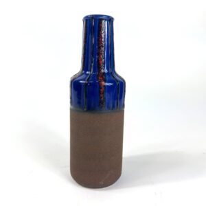 Vintage fat lava vase, West German 1970s, cobalt blue glaze over red-black texture, matte brown unglazed base