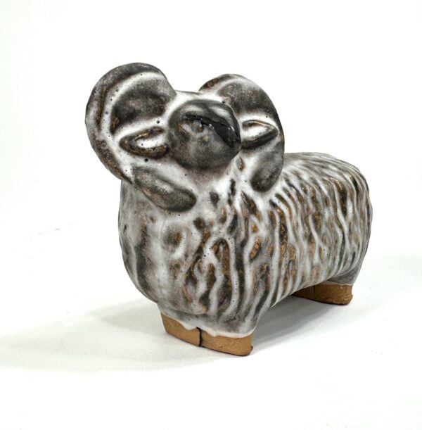 Angled three-quarter view displaying full form of Visby ceramic sheep with textured body pattern