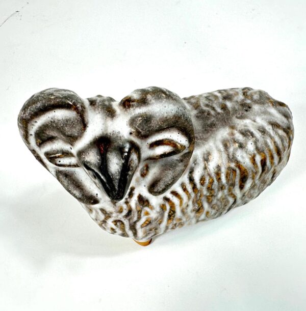 Detailed overhead view of pottery sheep showing sculptural form and textured glaze variations