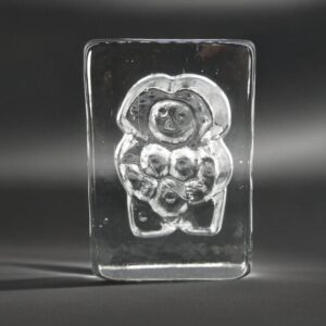 Lars Hellsten clear glass paperweight featuring engraved female form, Scandinavian art glass sculpture by Skruf Glassworks