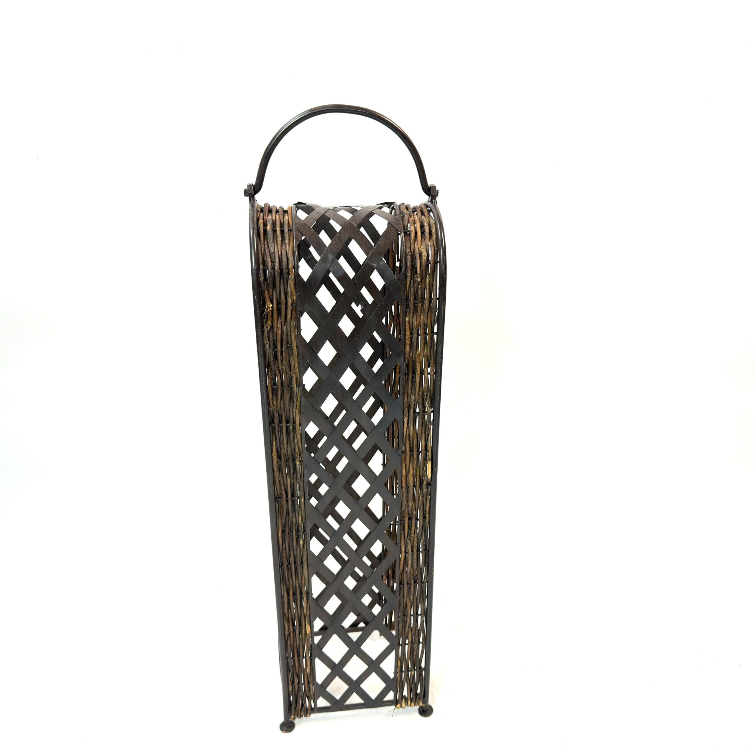 Angled shot revealing wicker trim texture and weathered patina along the edges of black metal framework