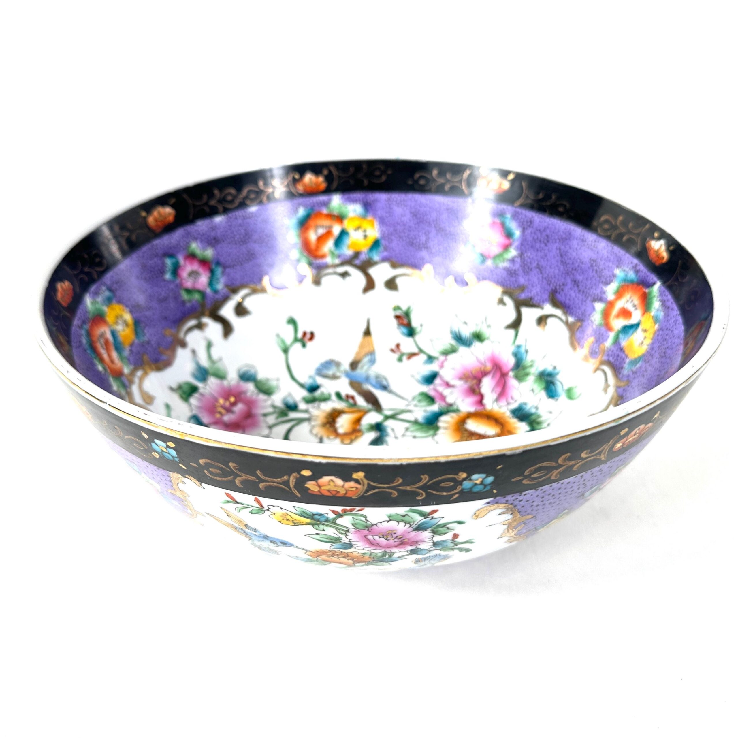 Antique chinoiserie porcelain bowl with hand-painted birds and flowers on lilac ground, black and gilt borders, front view