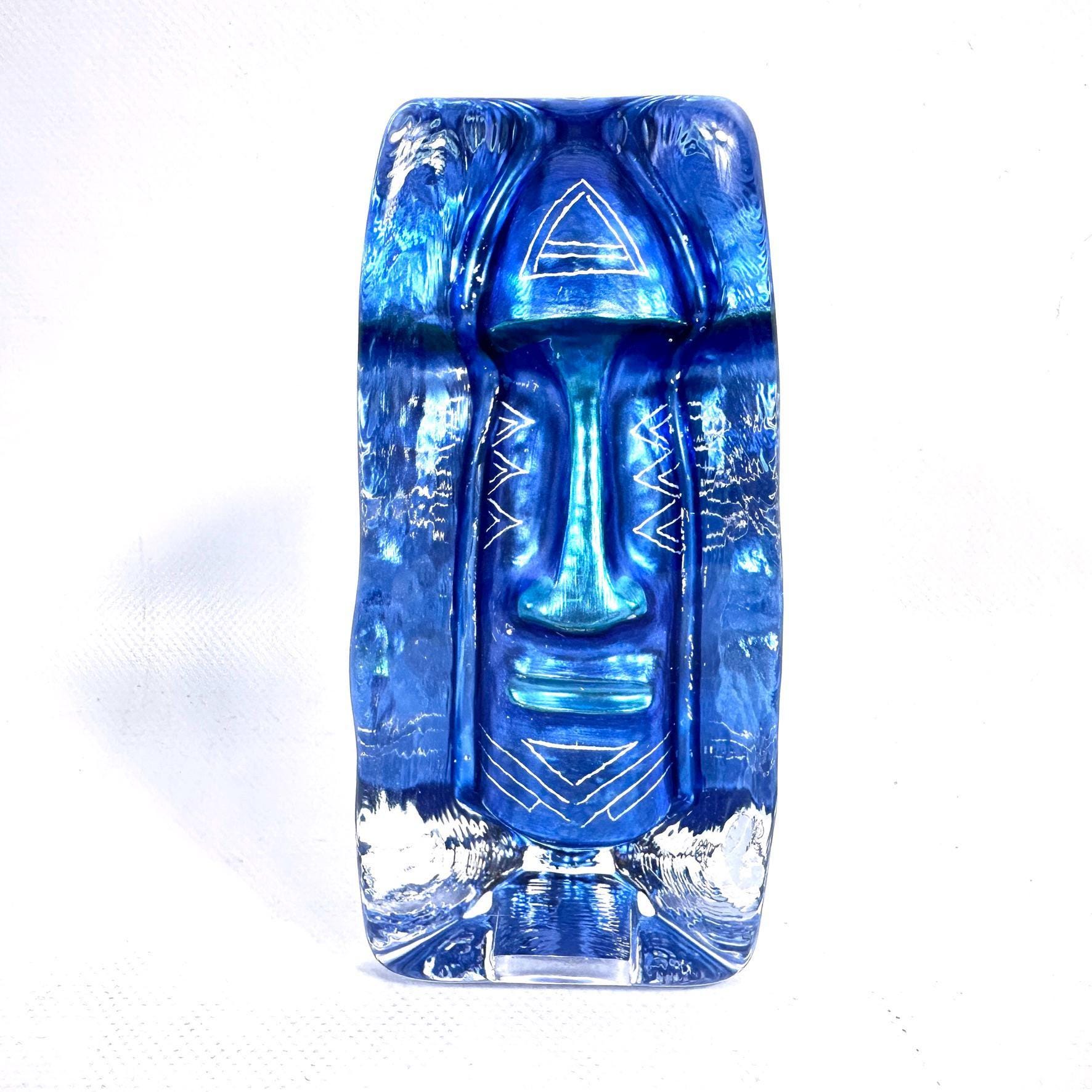 Blue glass face sculpture by Renate Stock, Sea Glasbruk, front view showing geometric tribal features and hand-painted linear