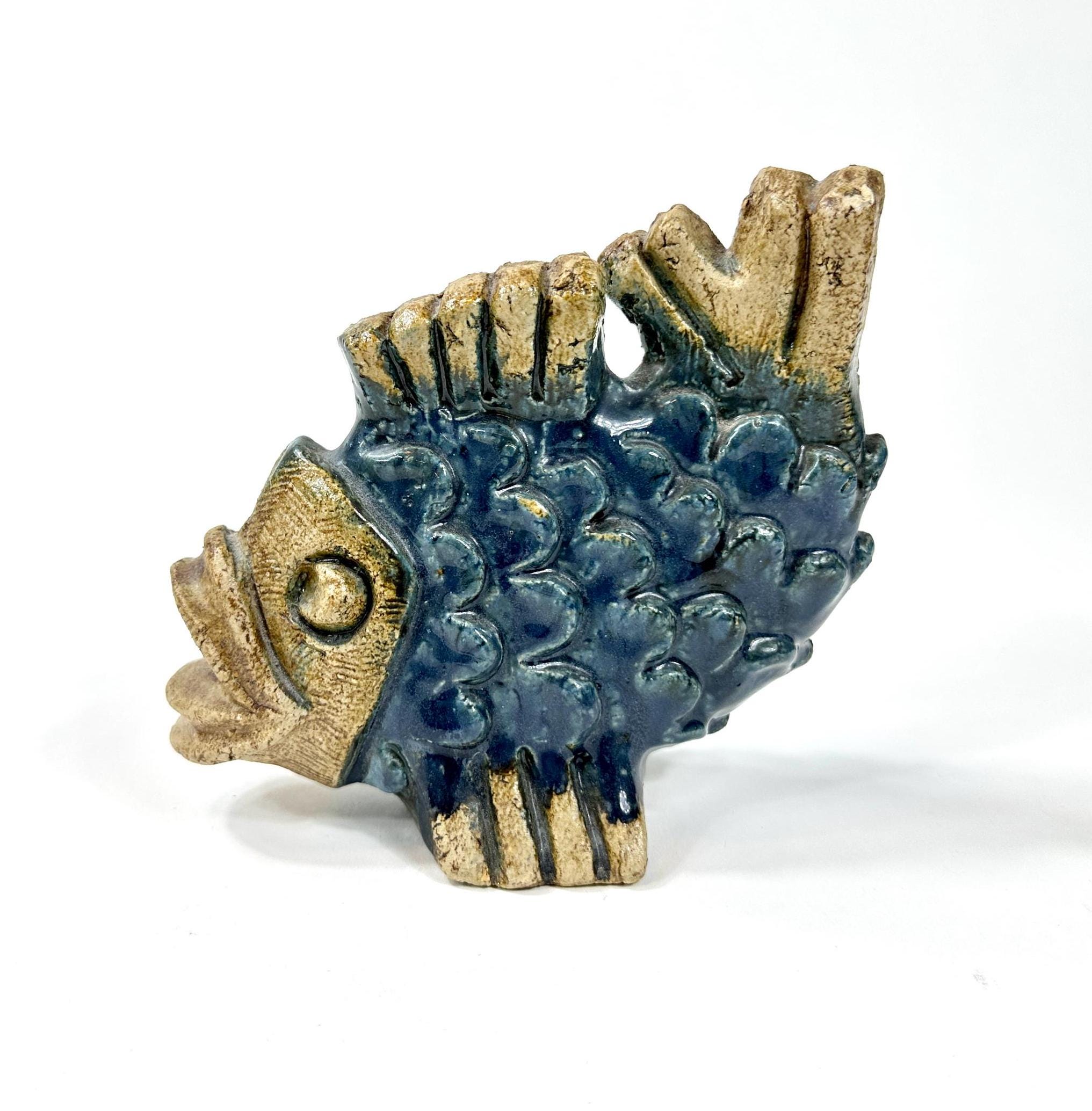Ceramic fish sculpture with deep blue glaze and gold-toned fins, designed by Willi Fischer for EGO Stengods, 1960s