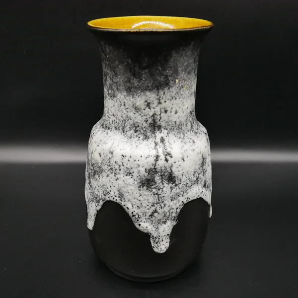 Ceramic vase standing alone showing complete lava texture coverage, golden rim detail, symmetrical front elevation