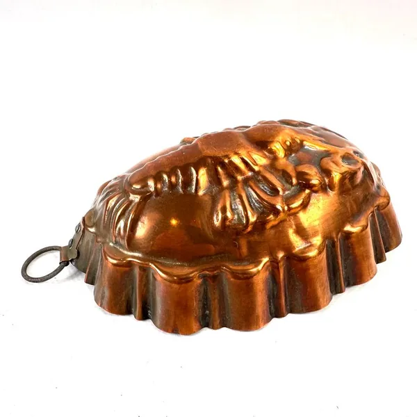Copper lobster mold showing full decorative scalloped trim and metal suspension ring