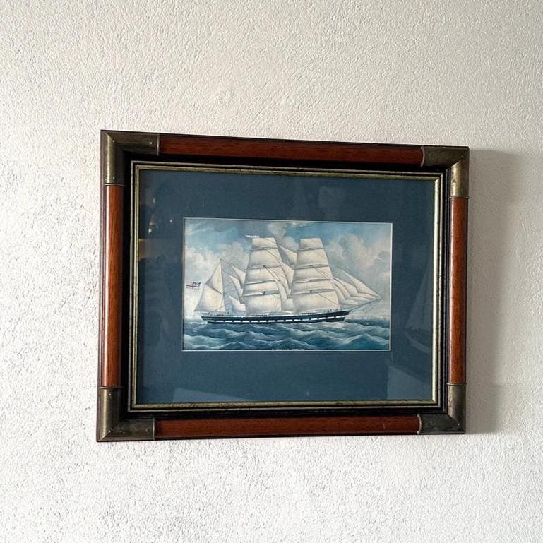 Framed barque VENUS maritime print showing full-rigged sailing ship under sail on blue water, wooden frame with brass corner 