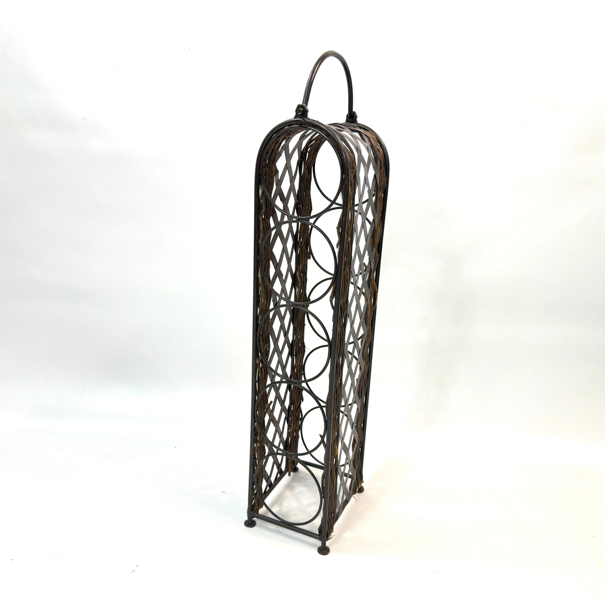 Full-length side-on photograph of vintage wine rack showing complete proportions from handle arch to base feet