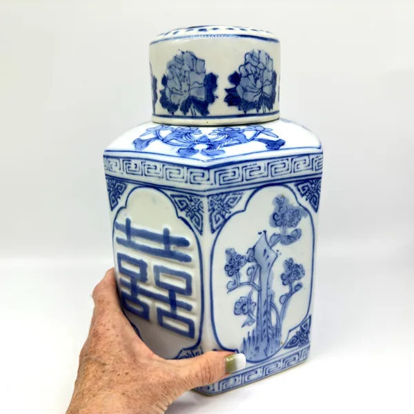 Ginger jar angled view showing both Double Happiness symbol and adjacent floral panel with bamboo motif