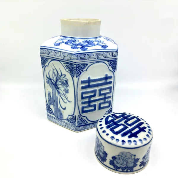 Ginger jar with matching smaller lidded box, showing complete ceramic set in blue and white porcelain