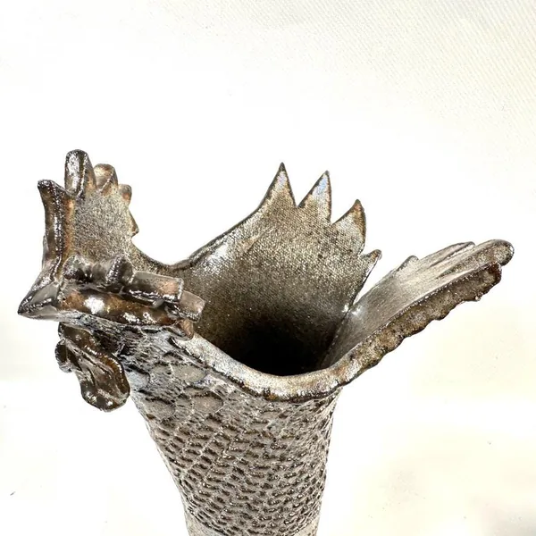 Interior view down into rooster vase opening showing hollow cavity, glaze application inside, and functional depth for water