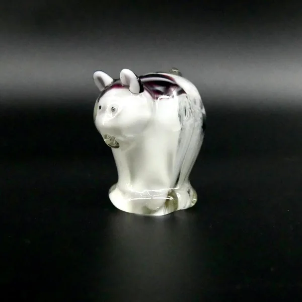 Murano-style glass cat shown from angled view displaying translucent quality, black striped markings, and sculptural details