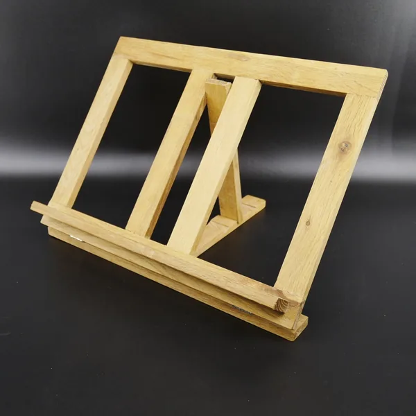 Natural wood recipe holder with twin support frames, three-quarter perspective showing adjustable angle and stable base platf