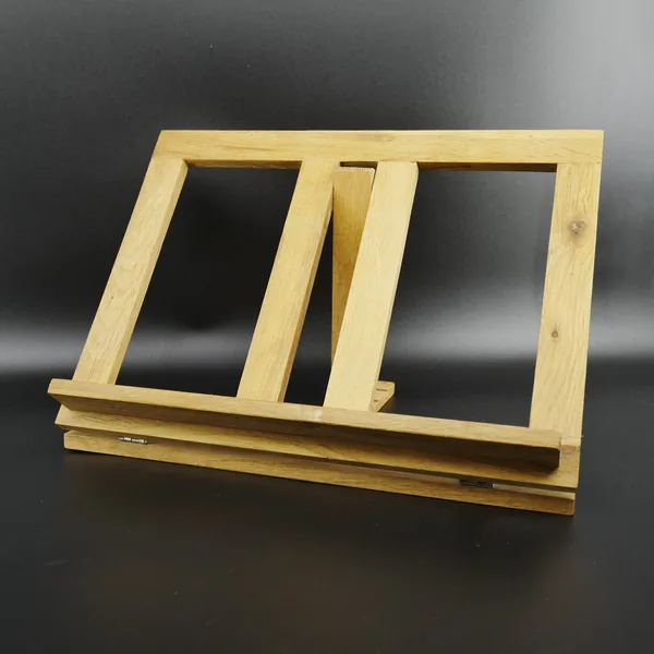 Natural wooden stand slightly tilted view, frame depth visible, support base prominent, complete structural design shown from