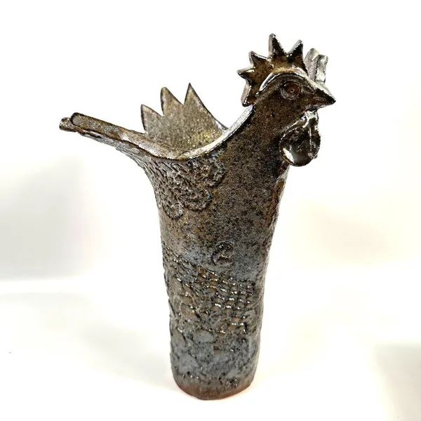 Rooster vase side angle showing complete rooster silhouette, textured body pattern, and empty opening ready for plant arrange