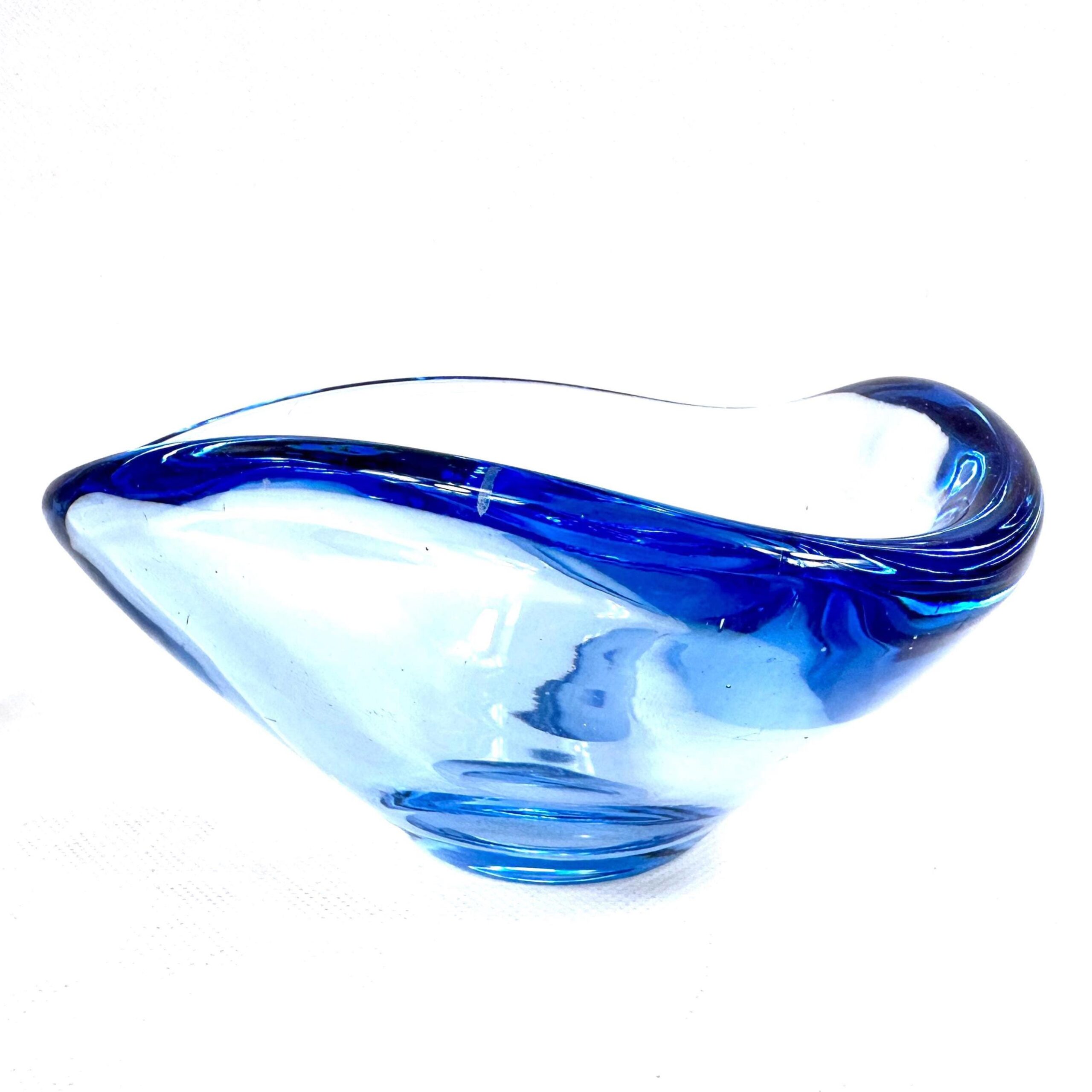 Scandinavian art glass bowl with curved blue rim and clear body, mouth-blown mid-century design, signed numbered base