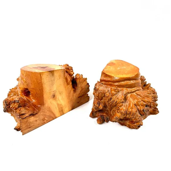 Side-by-side profile view of two burl wood bookends showing individual root wood contours and smooth lacquered top surfaces