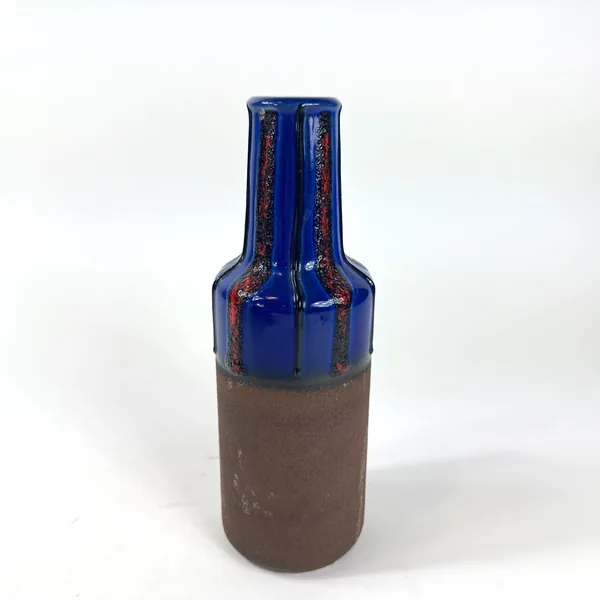 Straight-on overhead view of vase neck and opening, showing round rim, interior darkness, and exterior glaze surface patterns