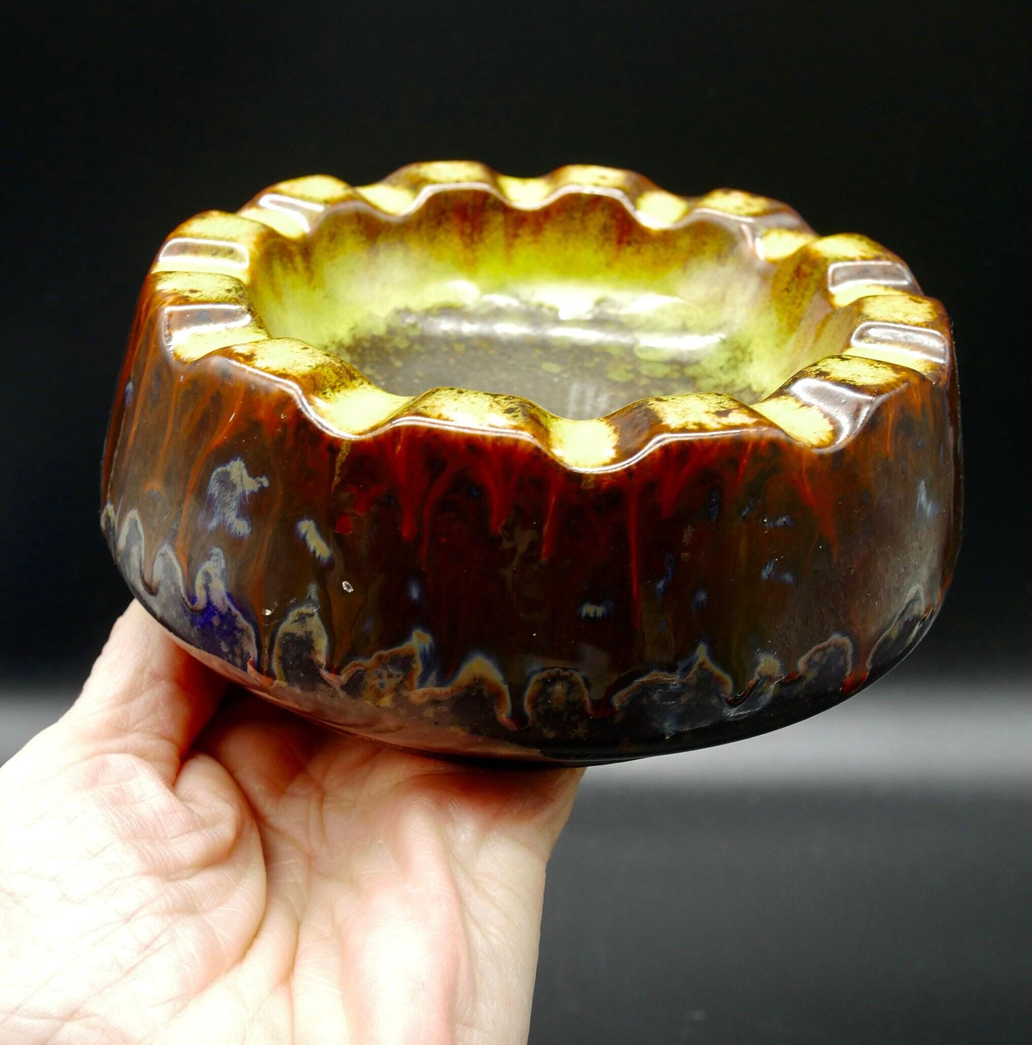 Strehla ashtray handled view showing form, molded rim architecture, glaze depth and patina