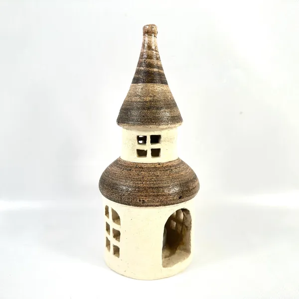 Tall ceramic church-style tower with conical striped roof, cream stoneware walls, four window openings, rounded base, side vi