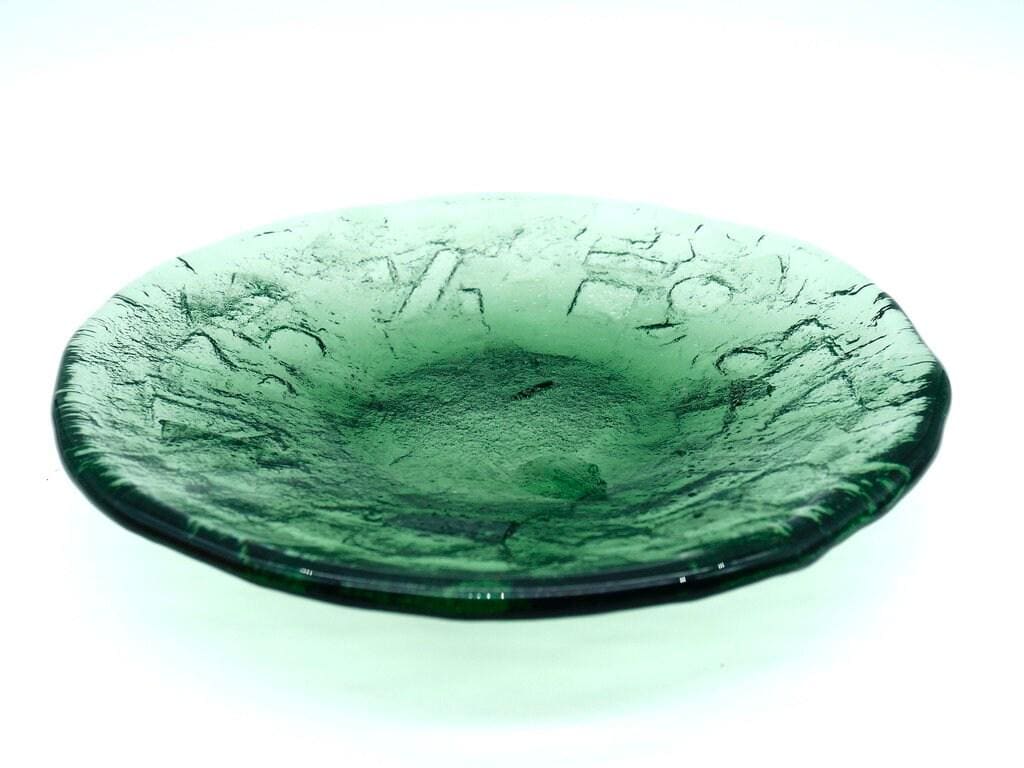 Top-down view of vintage Ruda plate showcasing interior texture and the bowl's gentle depression