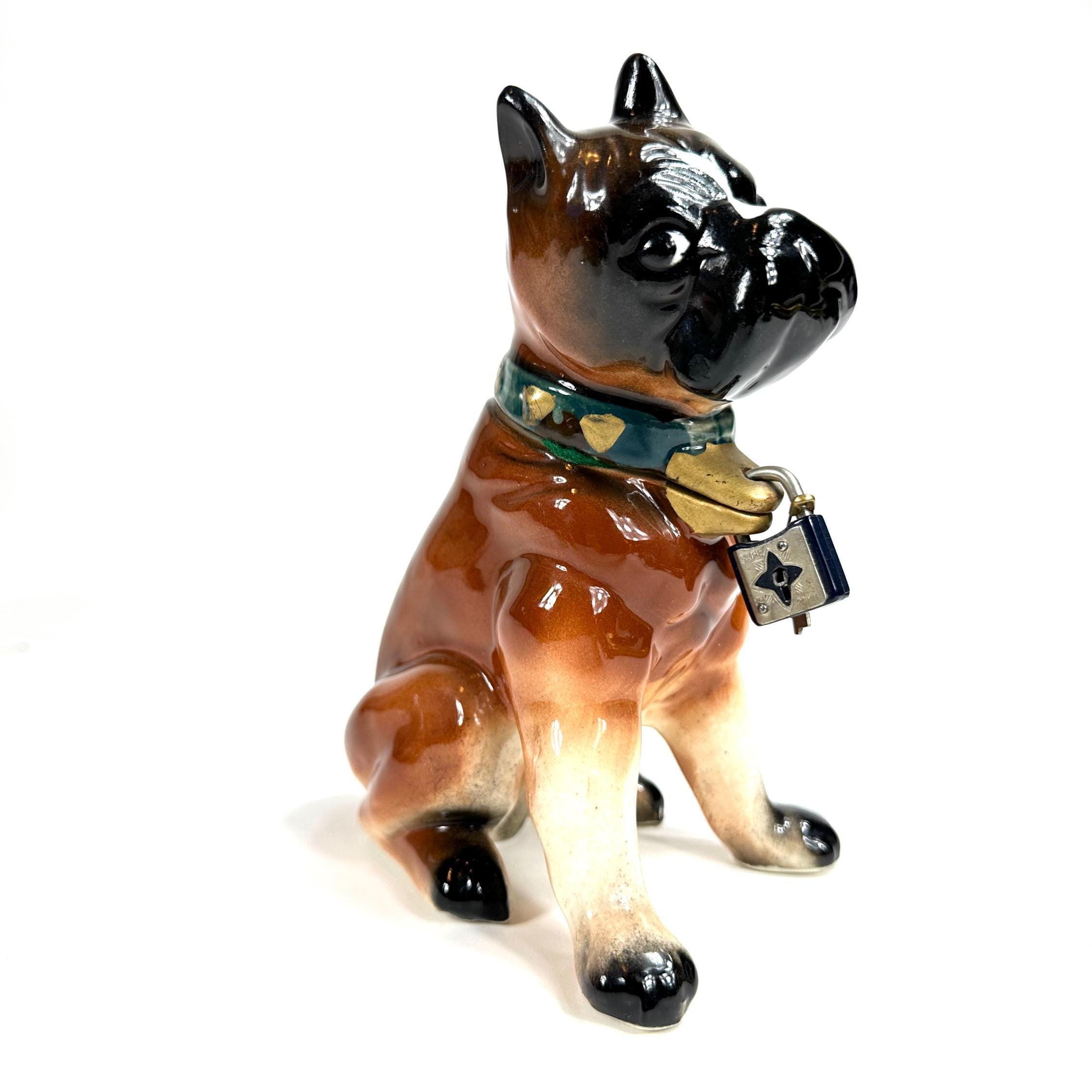 Vintage 1950s Kreiss Japan ceramic Boxer dog money bank, sitting upright with glossy amber and black glaze, green and gold co