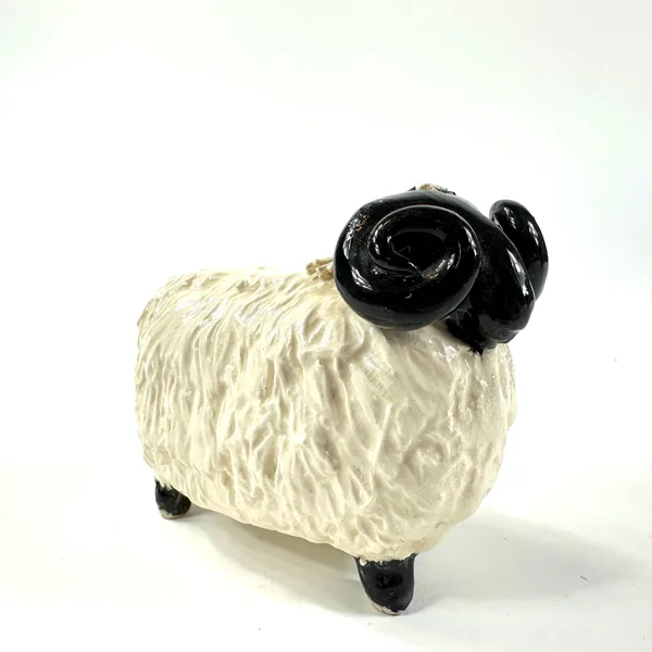 Vintage Castle Wynd Scottish ceramic sheep, full side profile, cream textured fleece, black horns and lower body