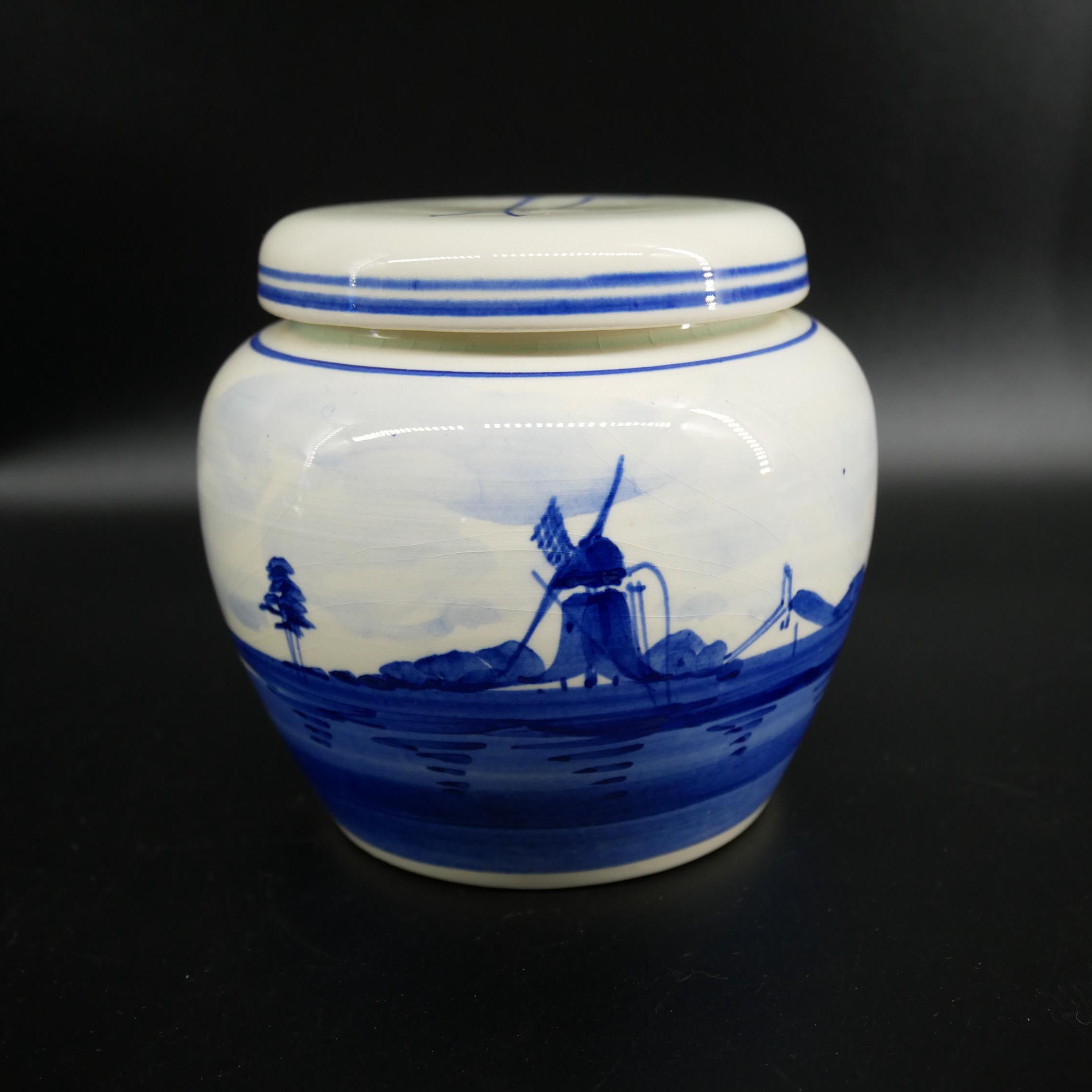 Vintage Dutch Delft Blue ceramic ginger jar with hand-painted windmill scene, cream and cobalt glazed lidded container from 1