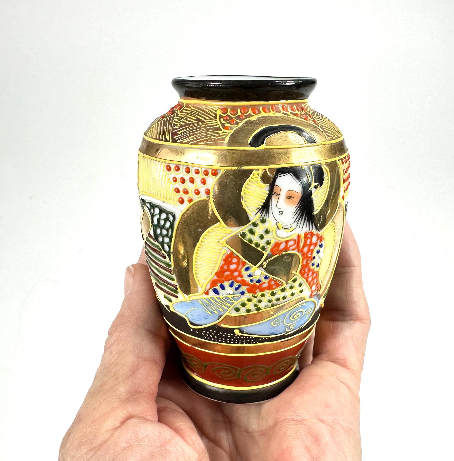 Vintage Satsuma vase in hand, gold-glazed porcelain with hand-painted geisha and moriage dragon details, black rim