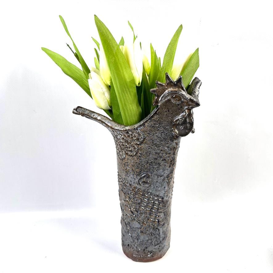 Vintage Scandinavian ceramic rooster vase with textured brown glaze, sculptural head and tail forming rim, holding fresh gree