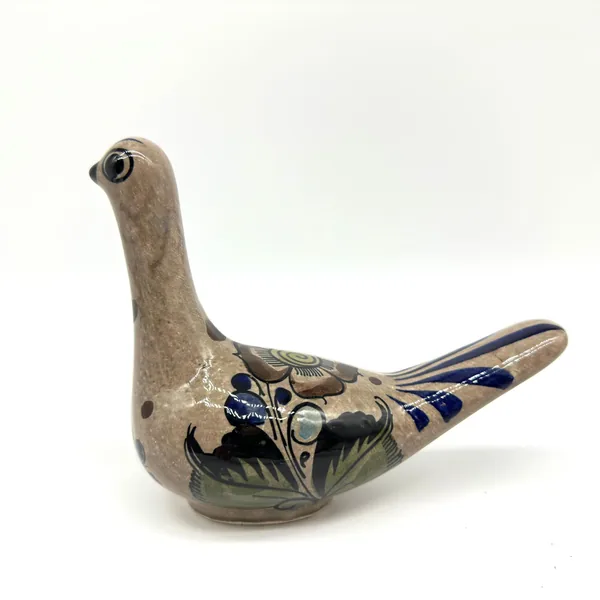 Vintage Tonalá ceramic bird sculpture, hand-painted with navy, green, and black floral motifs, natural clay finish, three-qua