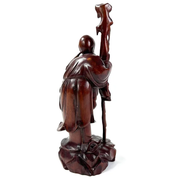Wooden scholar statue back view, ornate carved details, robe texture, staff positioning, vintage wood sculpture