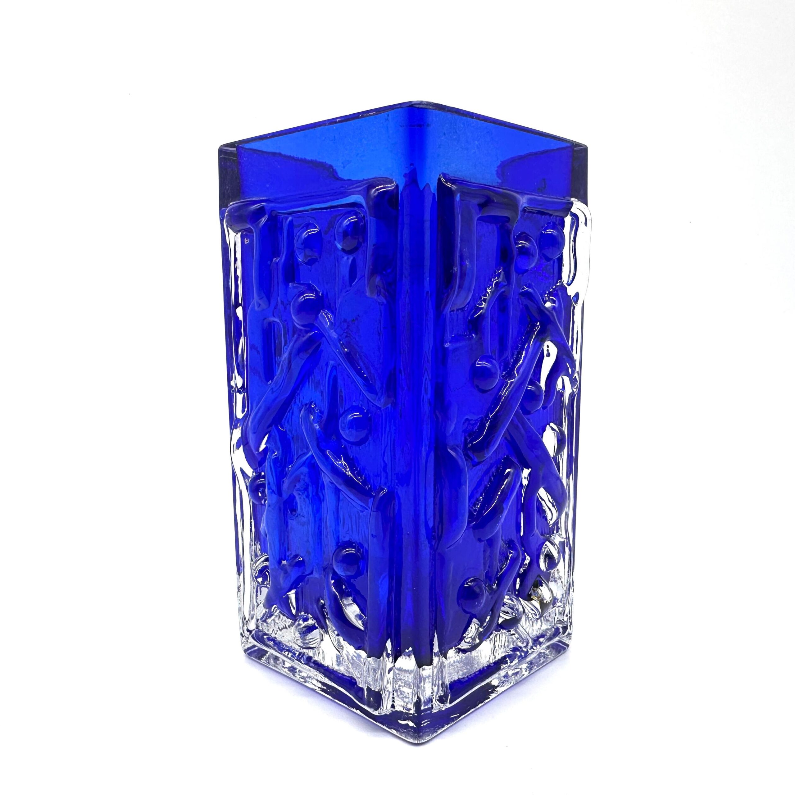 Corner view of Josef Schott vase showing triangular profile, cobalt blue interior, and clear glass outer structure with dimen