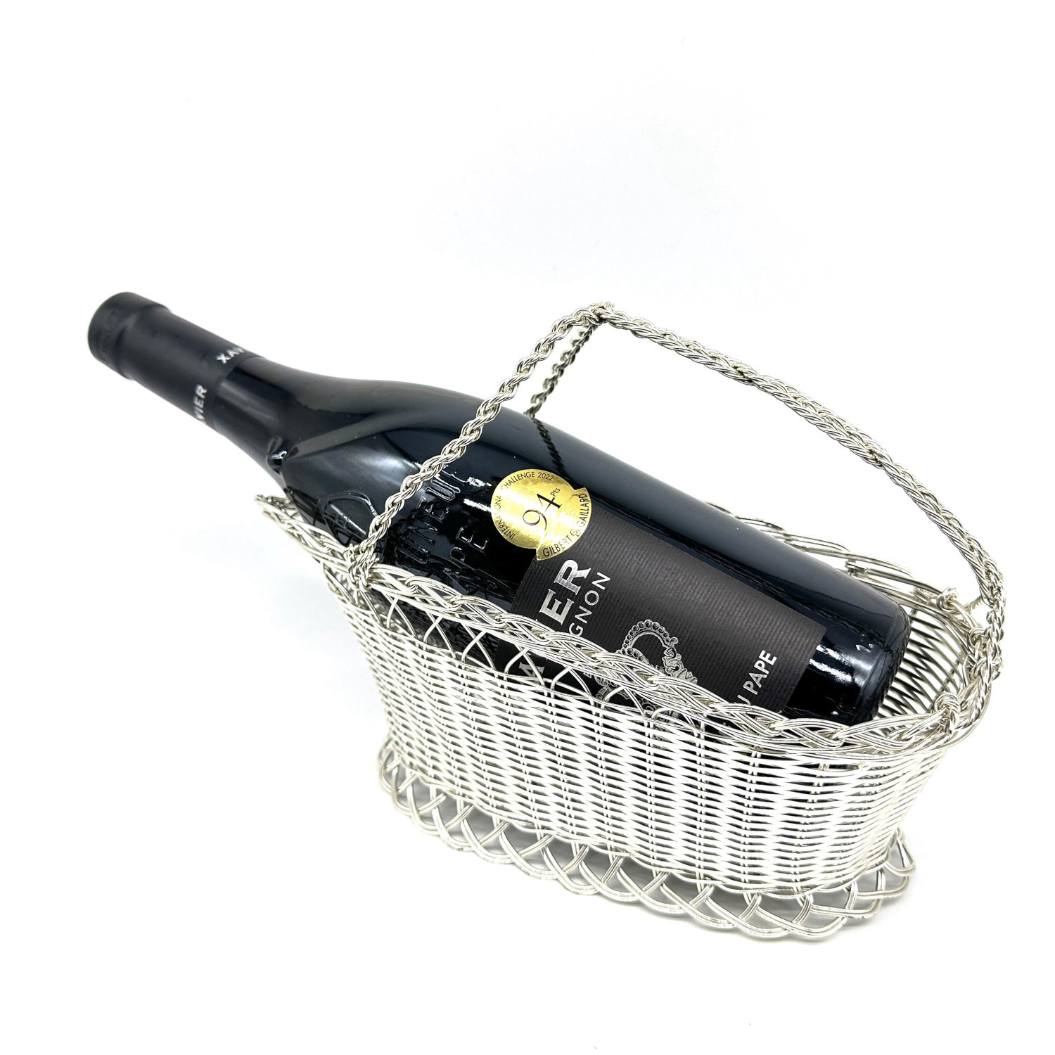 French silver-plated wine basket with woven metal design and rope handle, bottle displayed inside