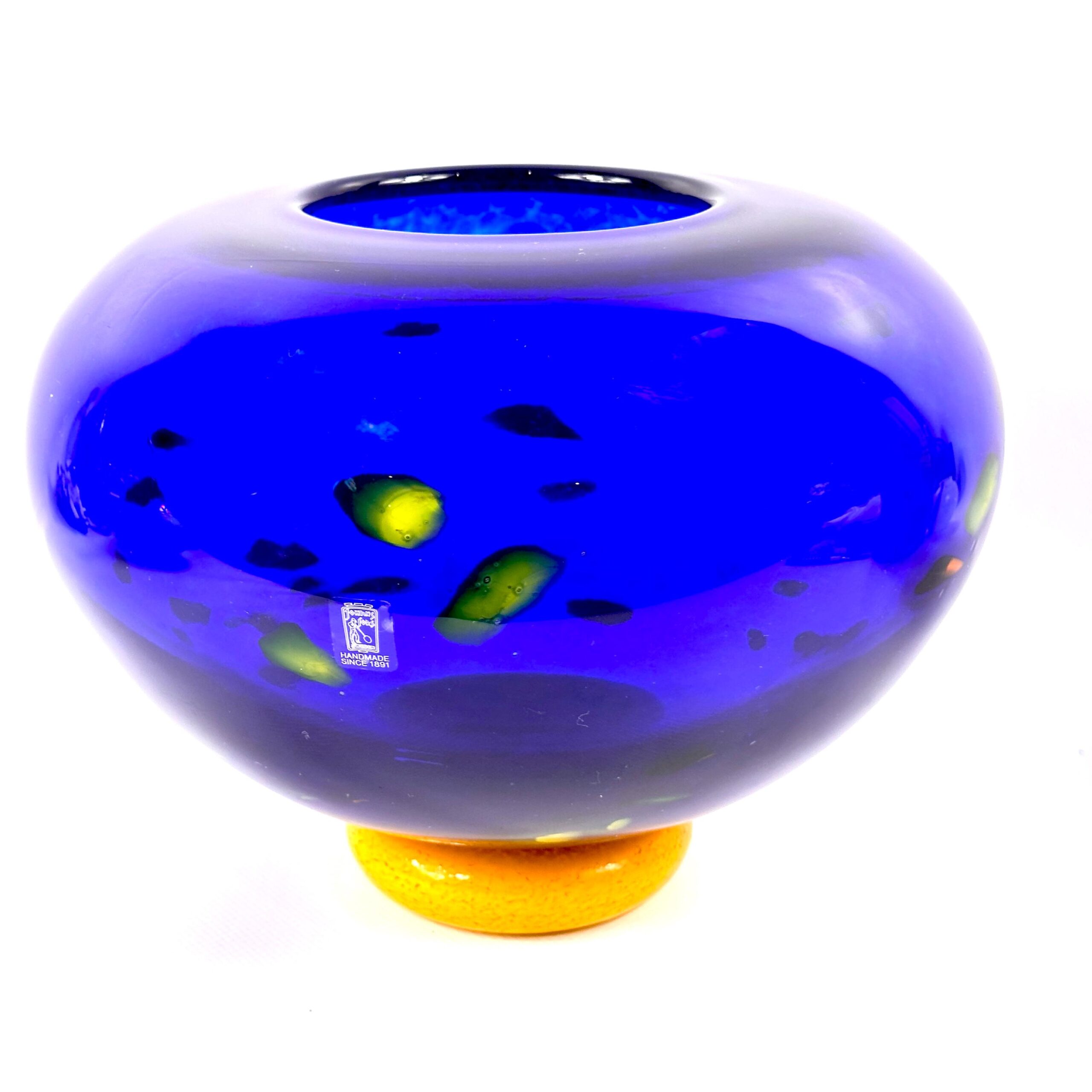 Full presentation view with warm lighting showing complete vase proportions and all color elements together