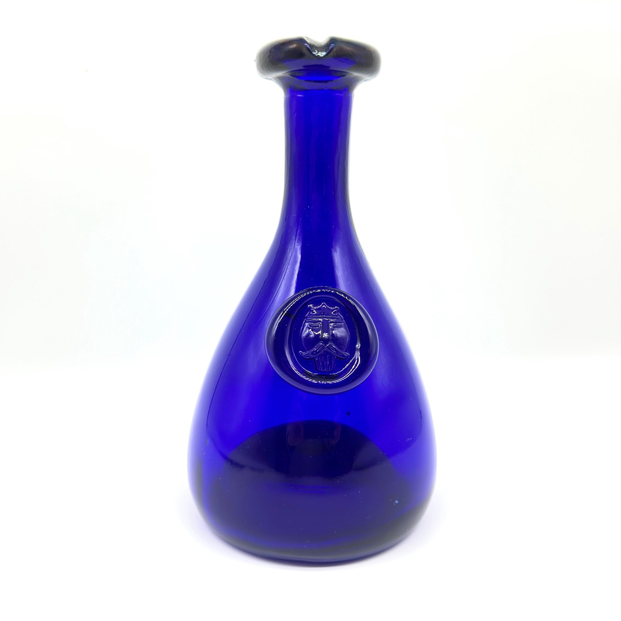 Ole Winther cobalt blue Viking bottle, Holmegaard 1960s, embossed Viking head seal, hand-blown teardrop form