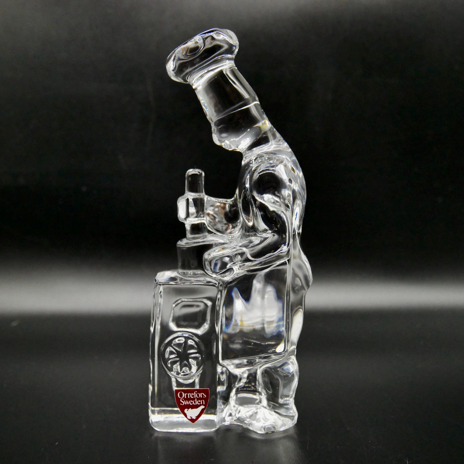 Orrefors 'Chef' glass figurine by Olle Alberius, full lead crystal sculpture with angled arm and torso against neutral backgr